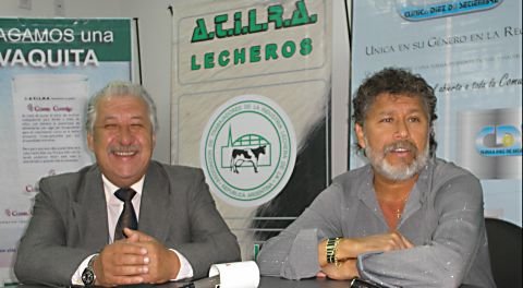 Héctor Ponce junto a Mario Bertoia, satisfechos por lo concretado.
